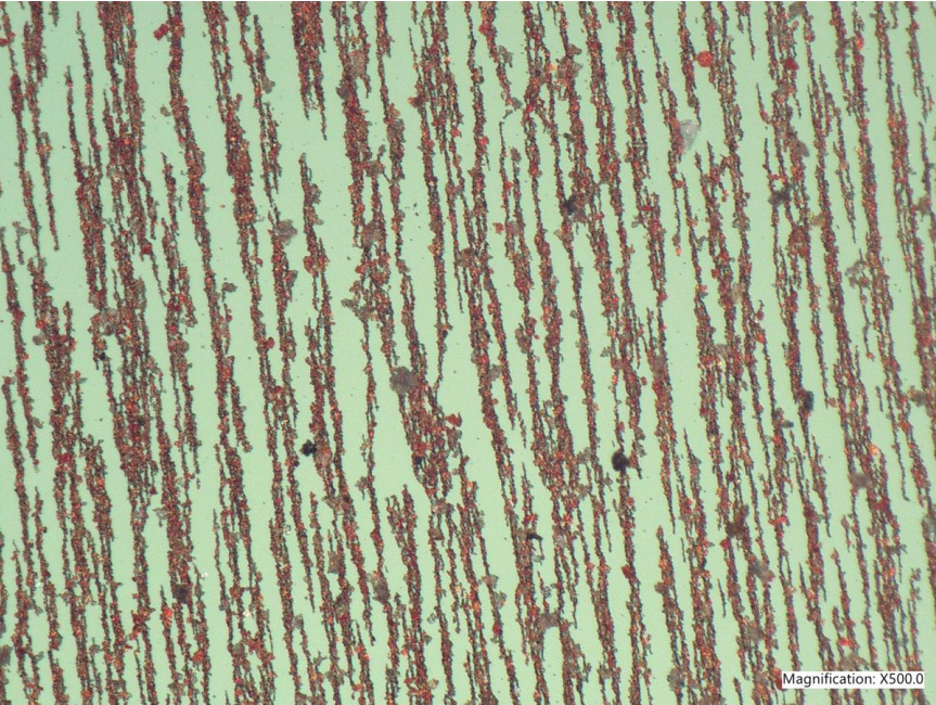 Analytical ferrography of the "rust" particulate from the paper machine roll cover